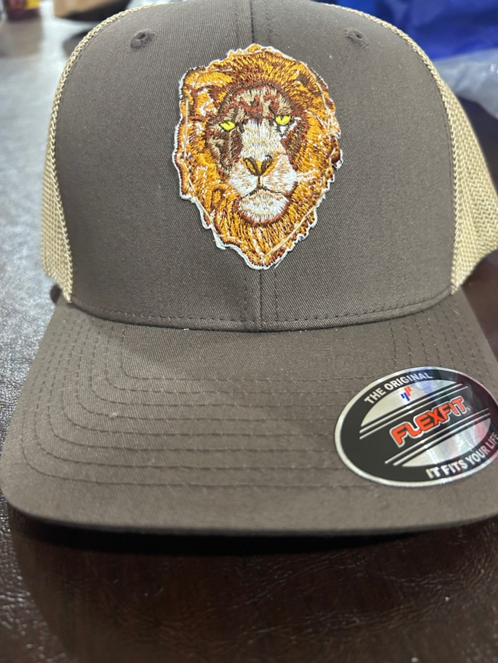 Brown and Tan Trucker Hat with Embroidered Lion!